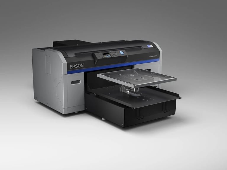 Epson SureColor printer with open input tray displayed from an angled view showing the large format printing system